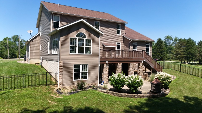 Welcome to this stunning two-story waterfront home in the highly - photo 5