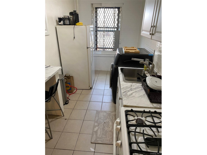Renovated 1-bedroom, 1-bath co-op featuring a bright living and - photo 6