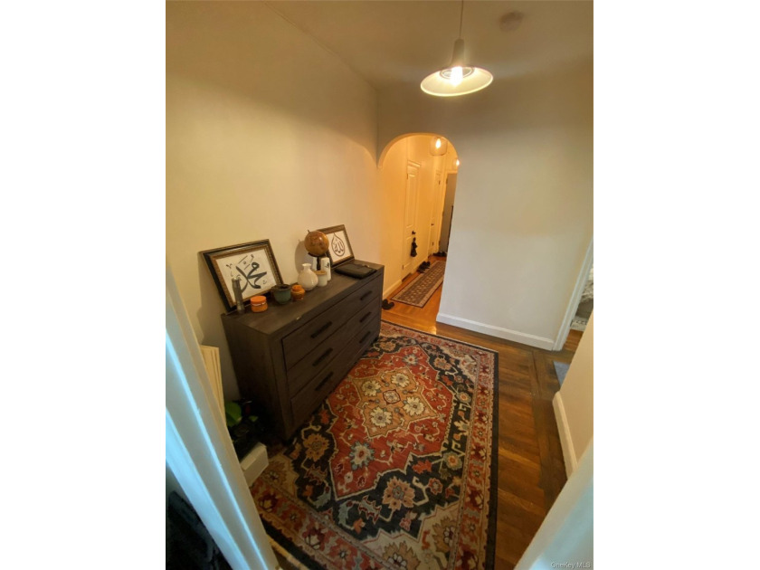 Renovated 1-bedroom, 1-bath co-op featuring a bright living and - photo 9