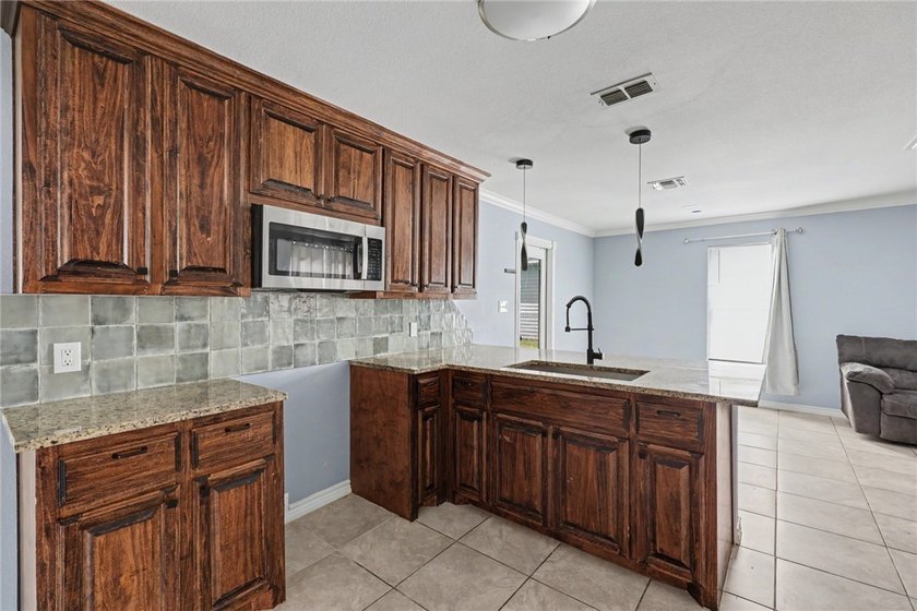 Looking for a move-in ready home with modern updates and - photo 8