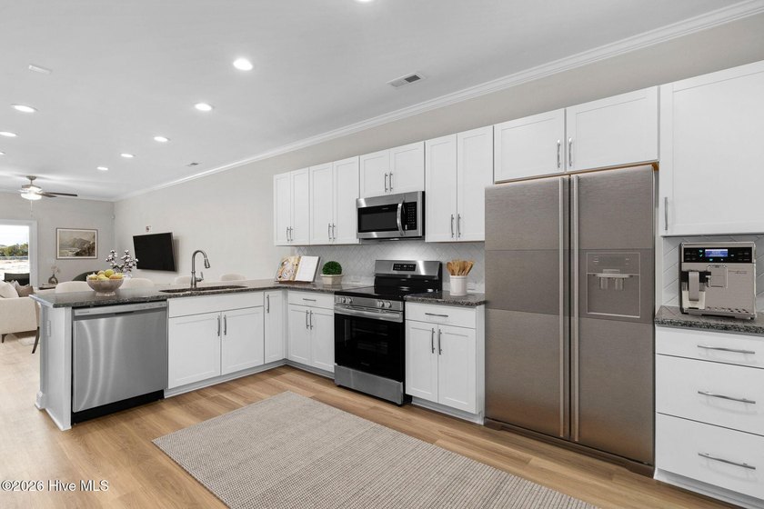 This move-in-ready townhome lives like a single-family home - photo 4