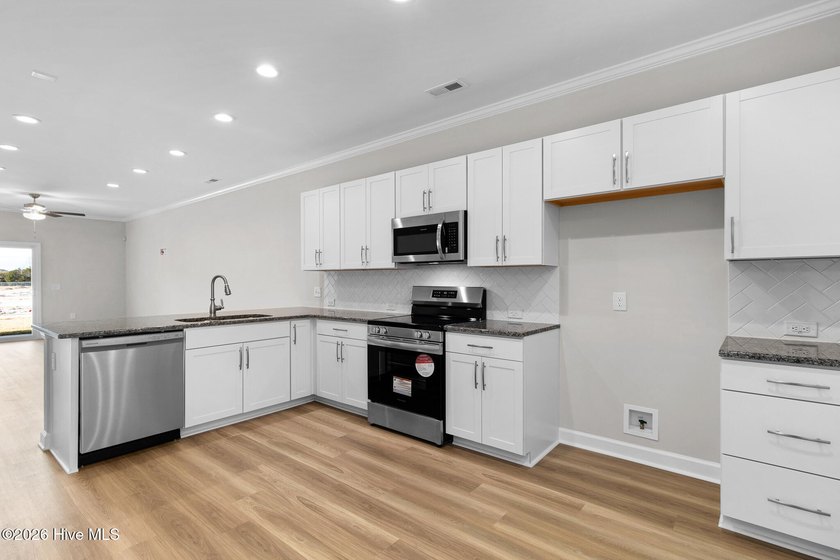 This move-in-ready townhome lives like a single-family home - photo 5