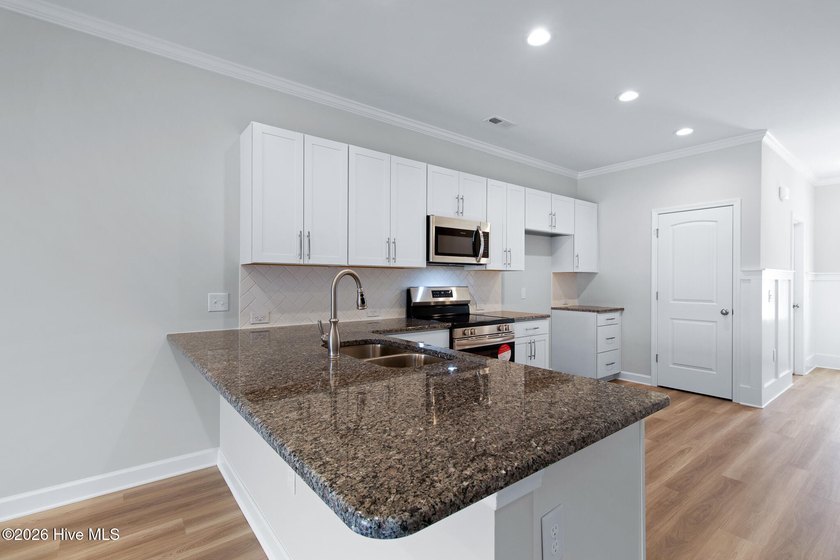 This move-in-ready townhome lives like a single-family home - photo 8