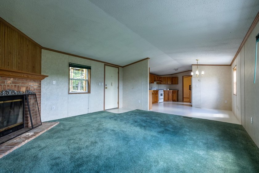Set on nearly 25 acres along the scenic Deerskin River in Phelps - photo 22