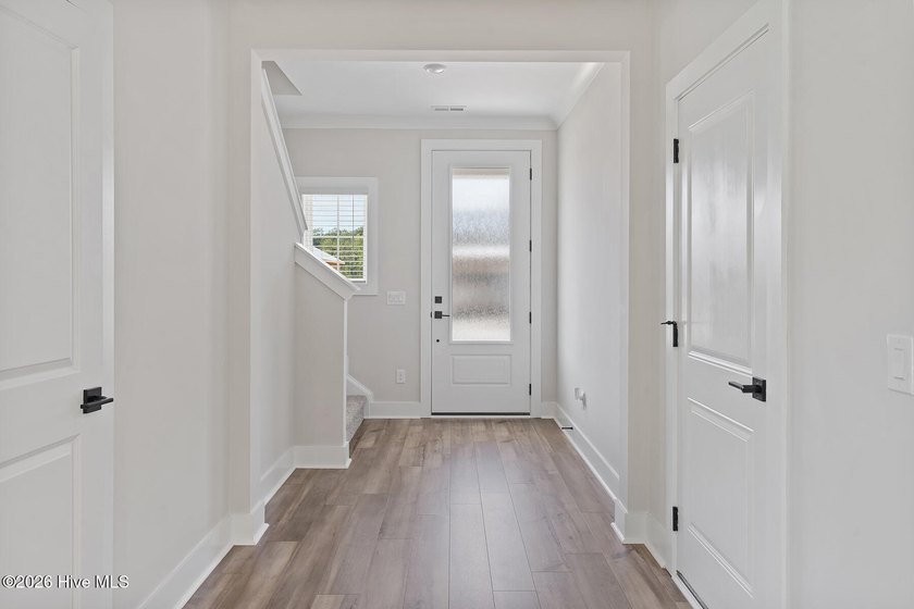 The Camden is a thoughtfully designed two-story home featuring - photo 3