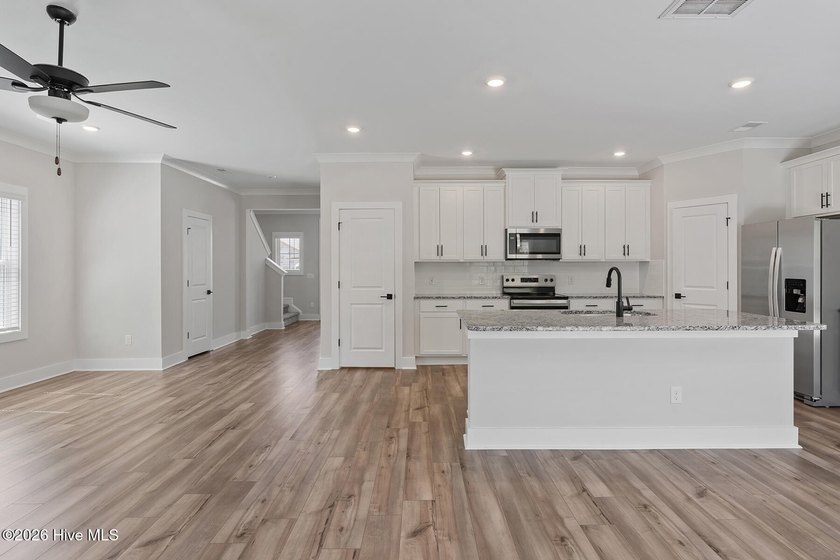 The Camden is a thoughtfully designed two-story home featuring - photo 4