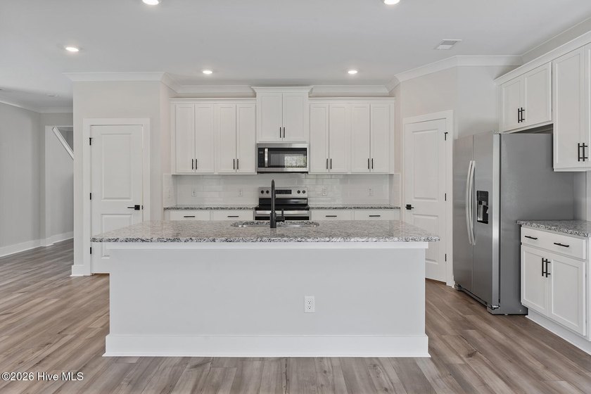 The Camden is a thoughtfully designed two-story home featuring - photo 6