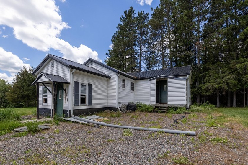Set on nearly 25 acres along the scenic Deerskin River in Phelps - photo 27