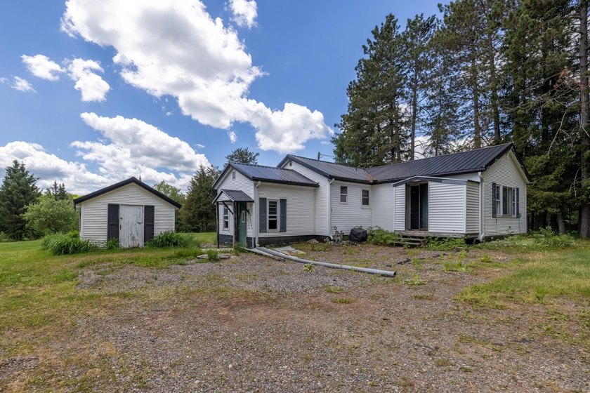Set on nearly 25 acres along the scenic Deerskin River in Phelps - photo 28