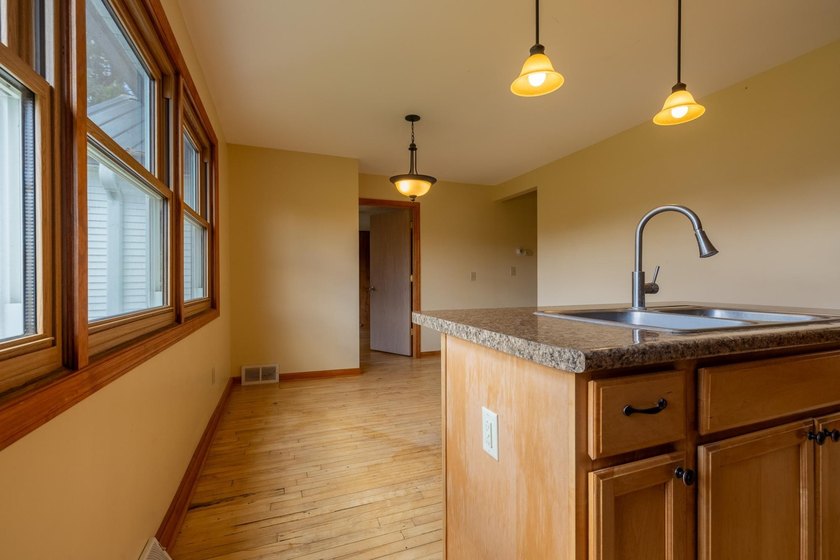 Set on nearly 25 acres along the scenic Deerskin River in Phelps - photo 29
