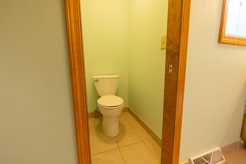 Set on nearly 25 acres along the scenic Deerskin River in Phelps - photo 31