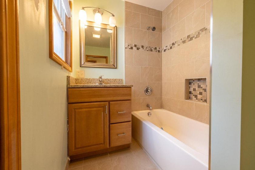 Set on nearly 25 acres along the scenic Deerskin River in Phelps - photo 32