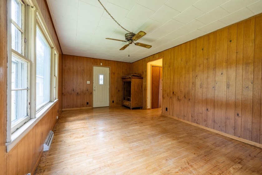 Set on nearly 25 acres along the scenic Deerskin River in Phelps - photo 33