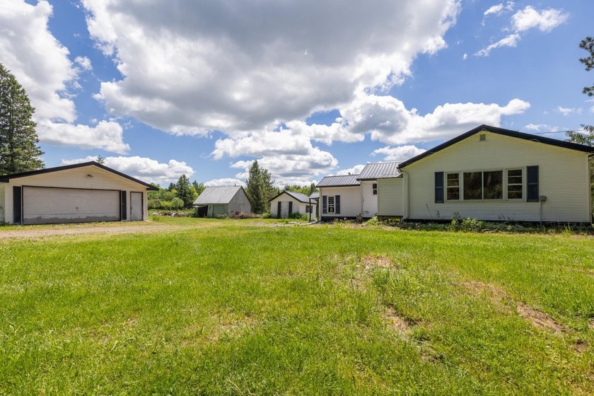 Set on nearly 25 acres along the scenic Deerskin River in Phelps - photo 35
