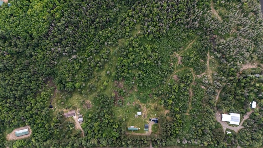 Set on nearly 25 acres along the scenic Deerskin River in Phelps - photo 39