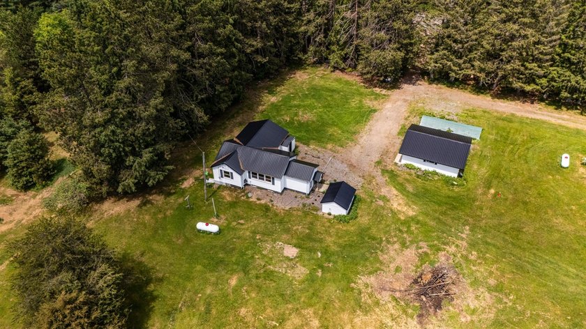Set on nearly 25 acres along the scenic Deerskin River in Phelps - photo 41