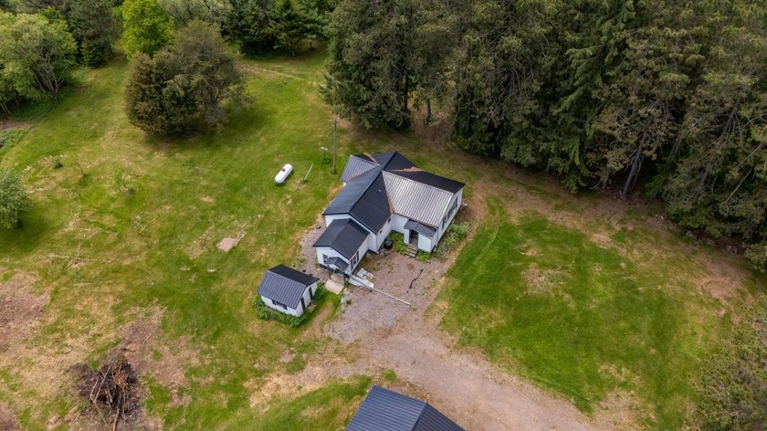 Set on nearly 25 acres along the scenic Deerskin River in Phelps - photo 43
