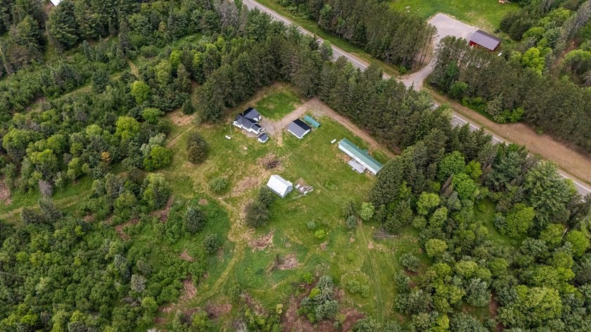 Set on nearly 25 acres along the scenic Deerskin River in Phelps - photo 45