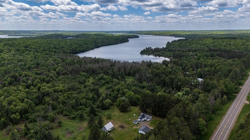 Set on nearly 25 acres along the scenic Deerskin River in Phelps - photo 49