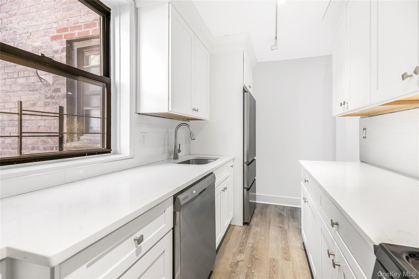 Discover this spacious and versatile one-bedroom residence with - photo 7