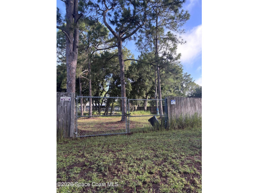 Build your home on this .24-acre homesite in desirable SE Palm - photo 2