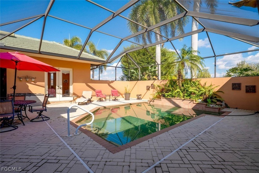 This stunning courtyard pool home at 15431 Greenock Ln, Fort - photo 11