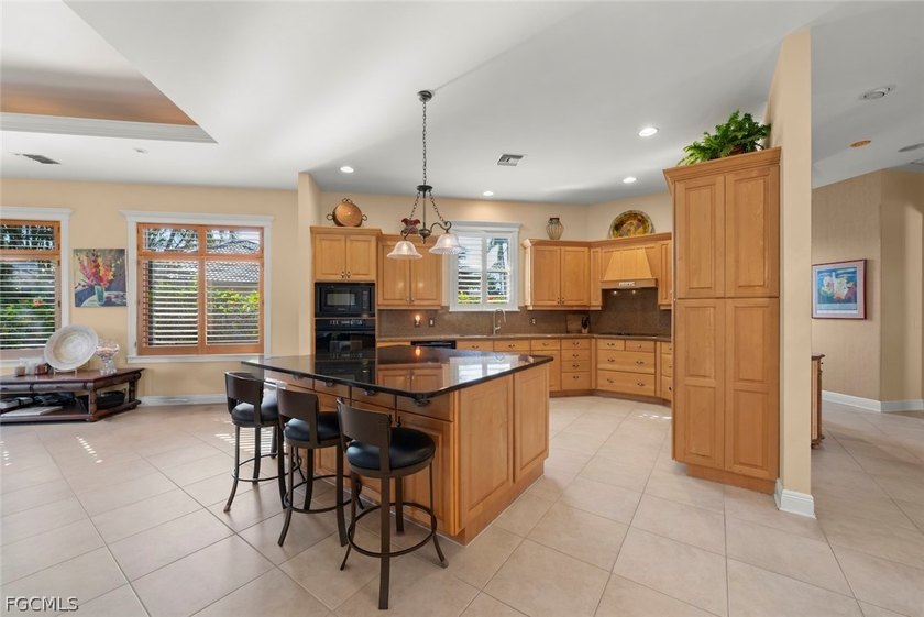 This stunning courtyard pool home at 15431 Greenock Ln, Fort - photo 22