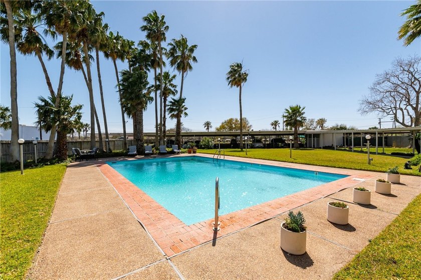 Wake up to sweeping ocean views from this beautifully refreshed - photo 4