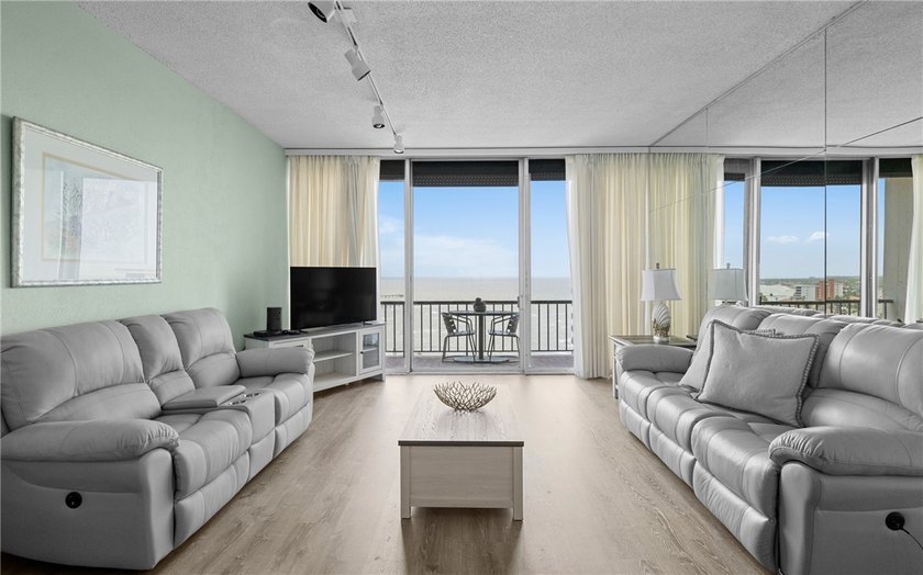 Wake up to sweeping ocean views from this beautifully refreshed - photo 6
