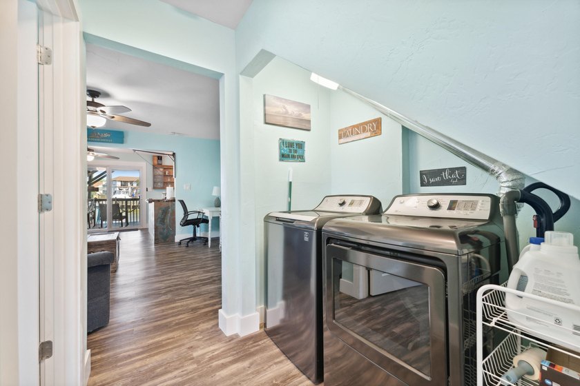 Waterfront living meets beach lifestyle in this beautifully - photo 15