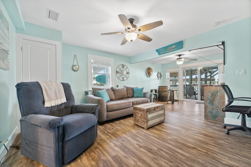 Waterfront living meets beach lifestyle in this beautifully - photo 16