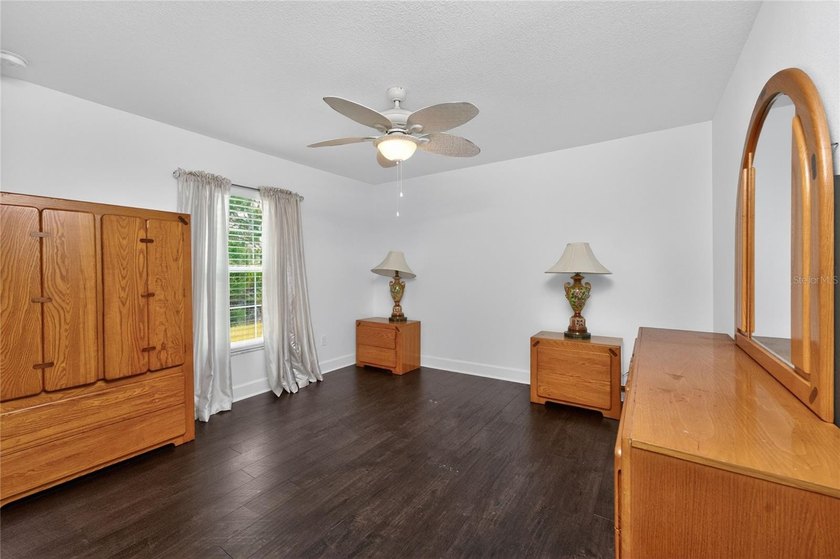 Welcome to this distinctive Key West-style home located in the - photo 22