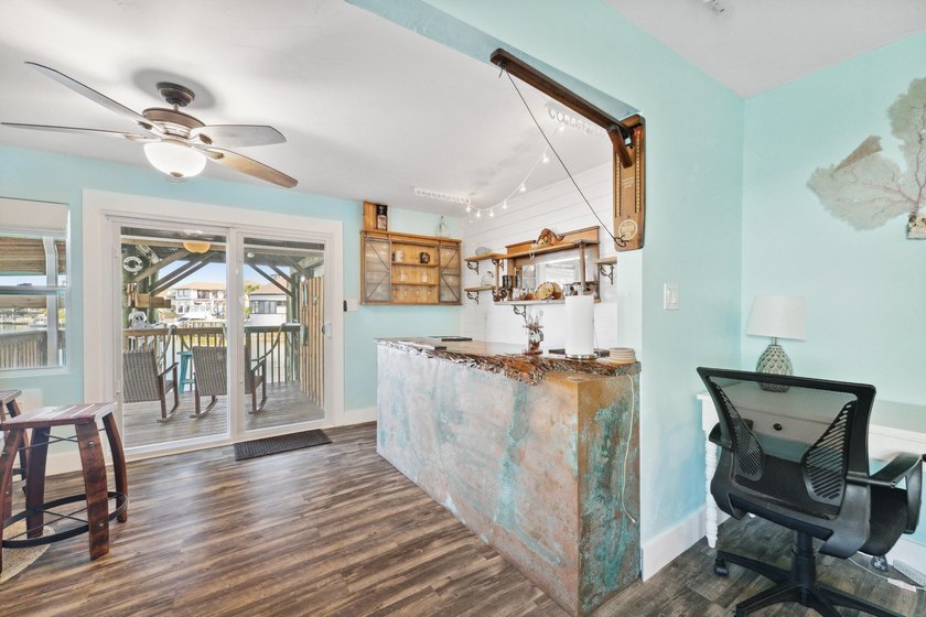 Waterfront living meets beach lifestyle in this beautifully - photo 23