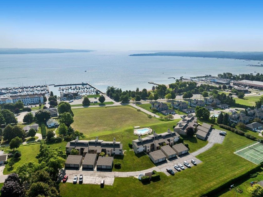 Welcome to one of Charlevoix's most coveted addresses. Perched - photo 2