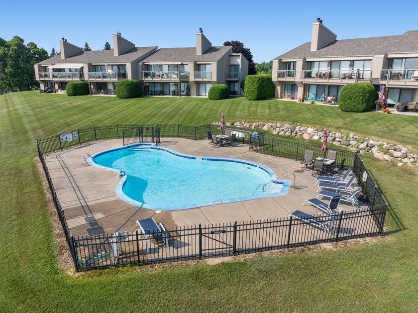 Welcome to one of Charlevoix's most coveted addresses. Perched - photo 3