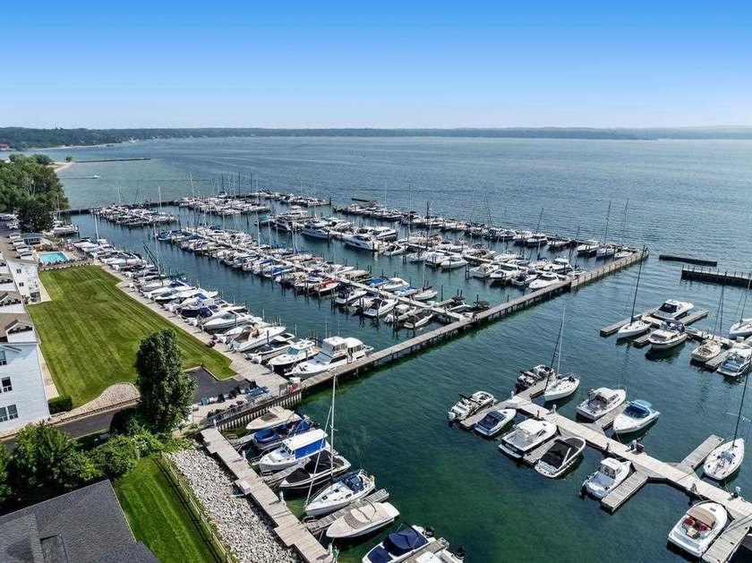 Welcome to one of Charlevoix's most coveted addresses. Perched - photo 4