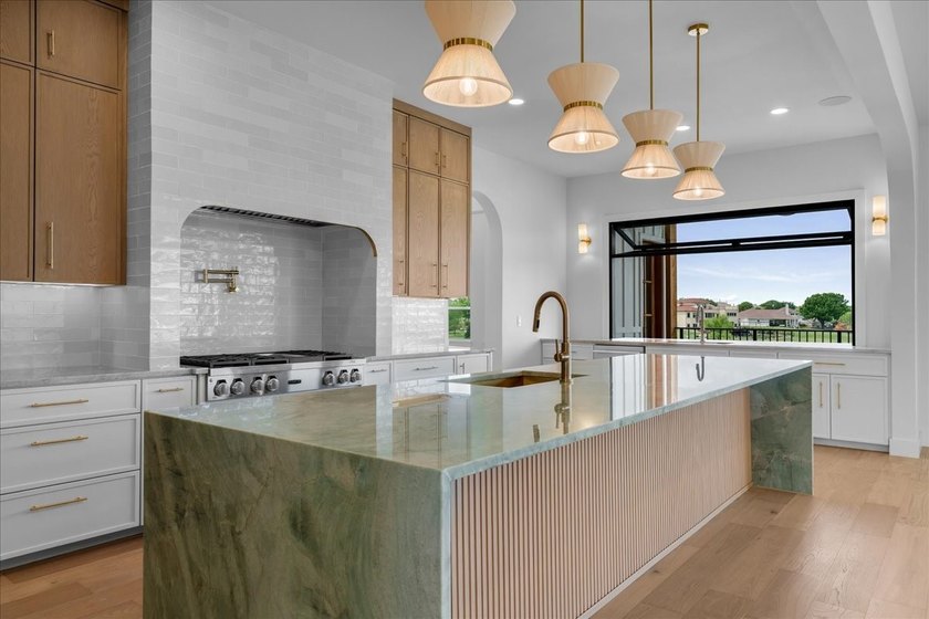 Experience extraordinary waterfront living in this stunning new - photo 7