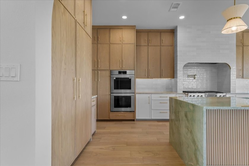 Experience extraordinary waterfront living in this stunning new - photo 9