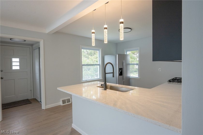Completely renovated inside and out, this charming cape cod - photo 11