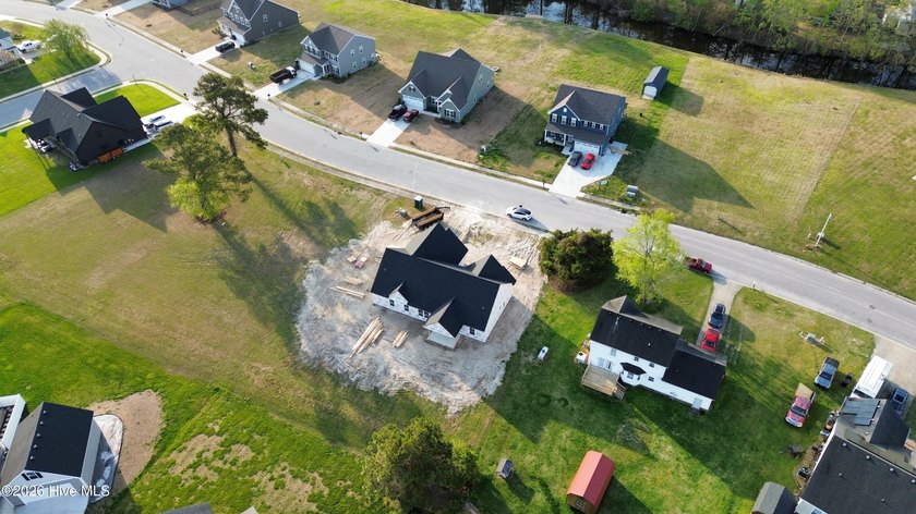 Discover modern farmhouse charm in Tooley Harbor with this - photo 8