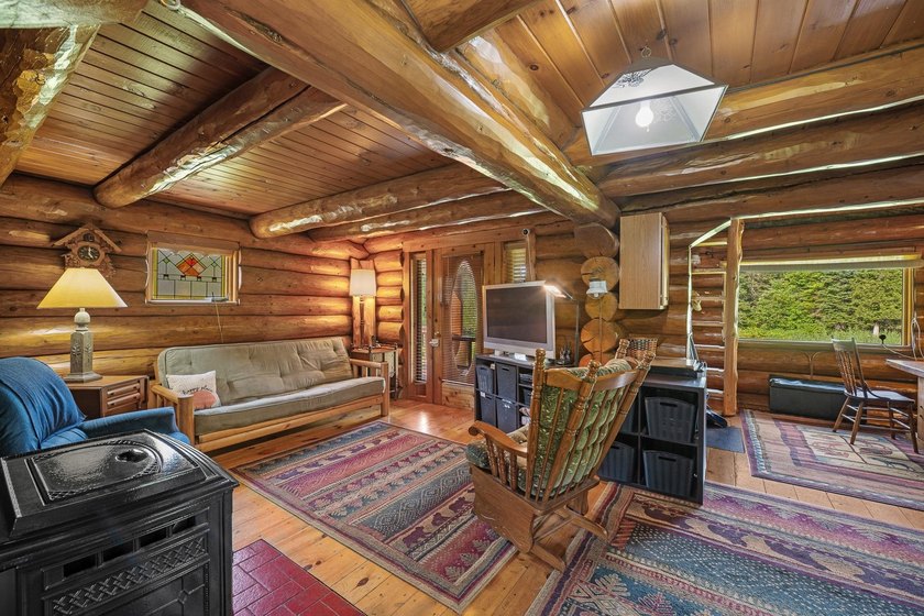 Unique in every way! This spectacular handcrafted full-log home - photo 27