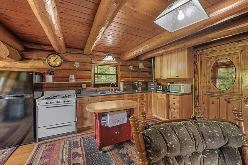 Unique in every way! This spectacular handcrafted full-log home - photo 28