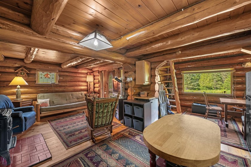 Unique in every way! This spectacular handcrafted full-log home - photo 30