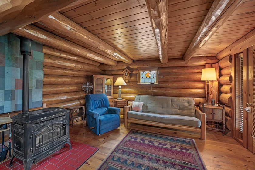Unique in every way! This spectacular handcrafted full-log home - photo 31