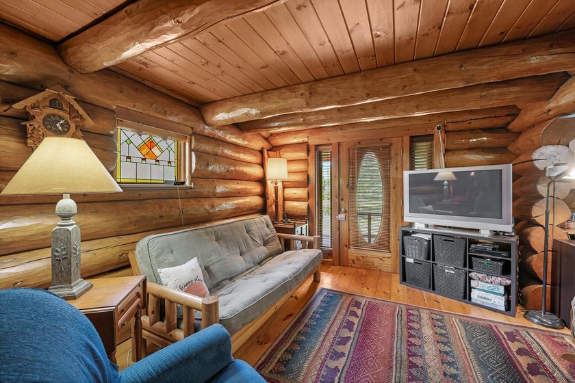 Unique in every way! This spectacular handcrafted full-log home - photo 33