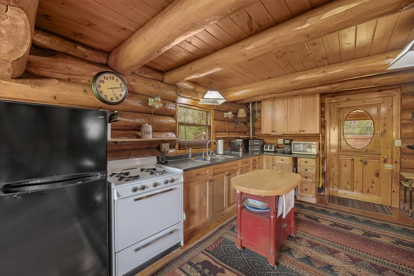 Unique in every way! This spectacular handcrafted full-log home - photo 34
