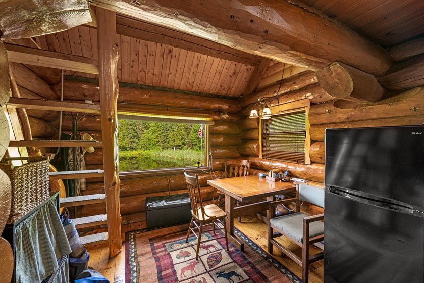 Unique in every way! This spectacular handcrafted full-log home - photo 36