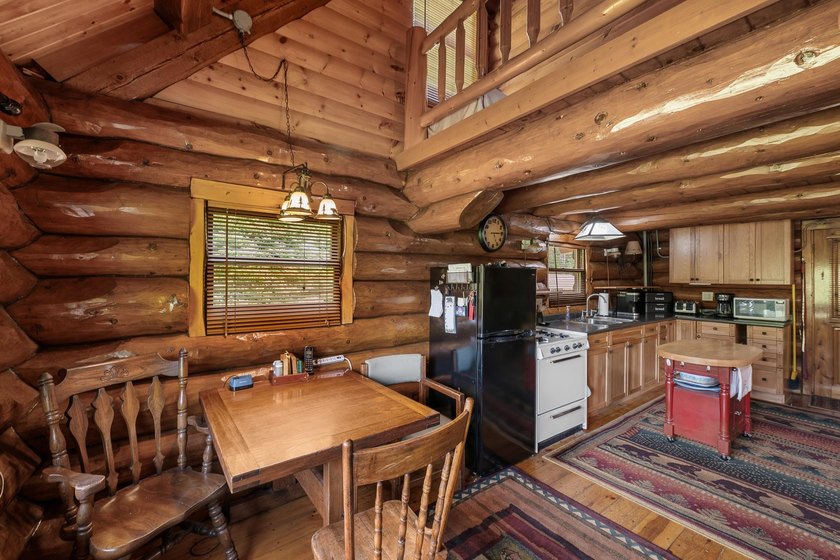 Unique in every way! This spectacular handcrafted full-log home - photo 37