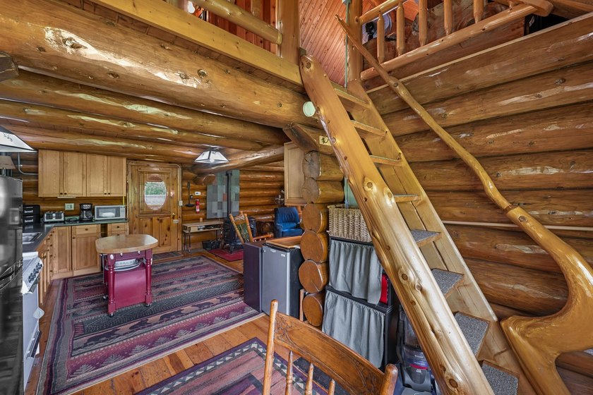 Unique in every way! This spectacular handcrafted full-log home - photo 38