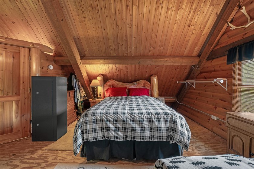 Unique in every way! This spectacular handcrafted full-log home - photo 43